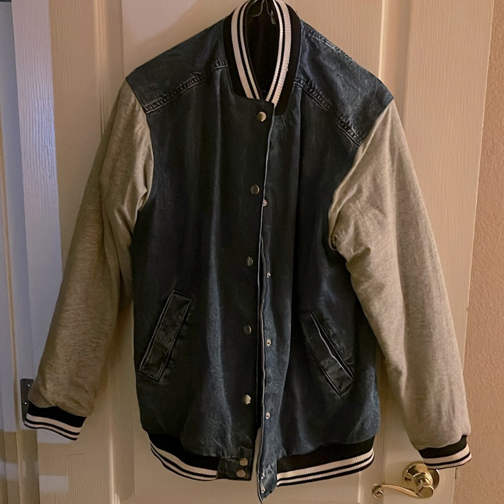 Jean jacket size extra small.  Grey sleeves. Brand is Divided from H&M.